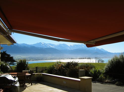 Euro awning  open over porch overlooking mountains